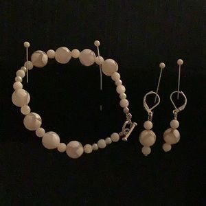 A single bracelet with matching earrings.It’s 8 inches long.Earrings are1& 1/2”